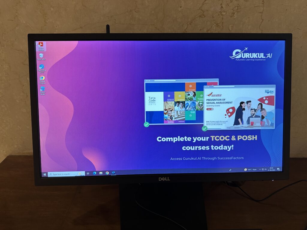 a computer monitor with a purple and blue background