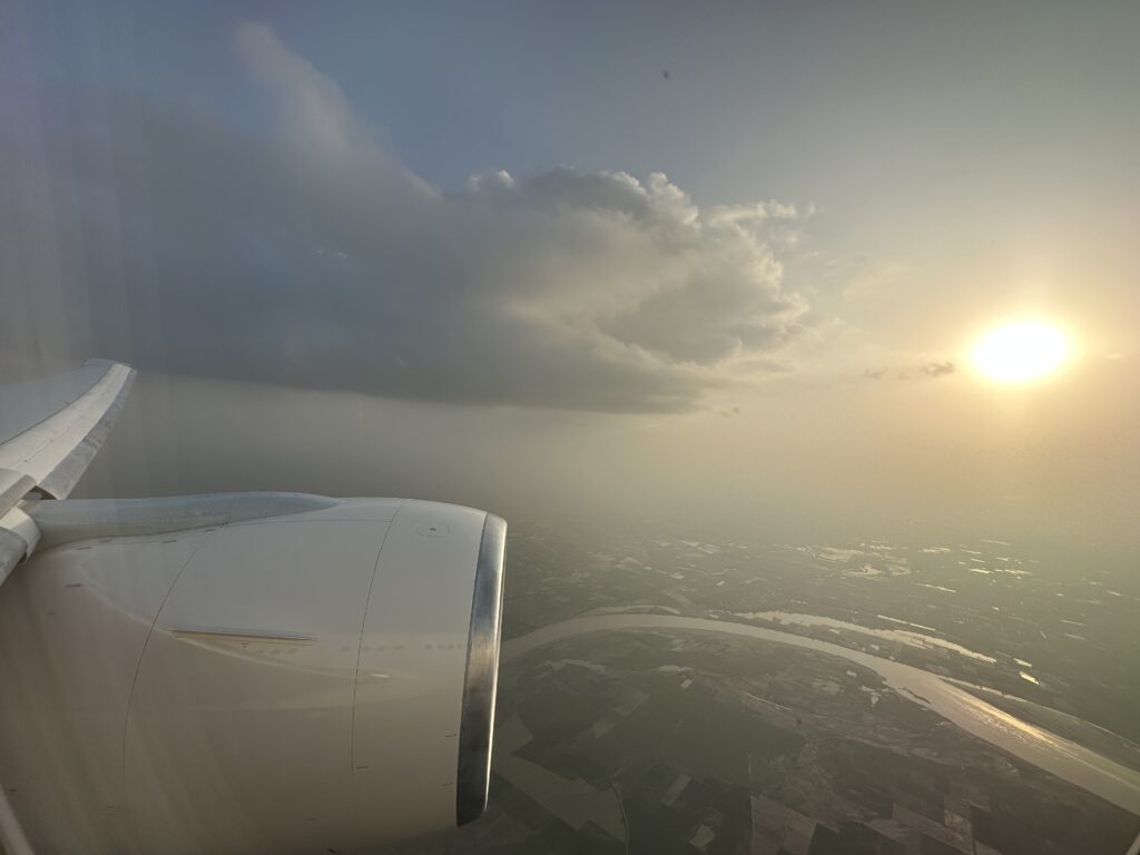 a view of the sun from an airplane window