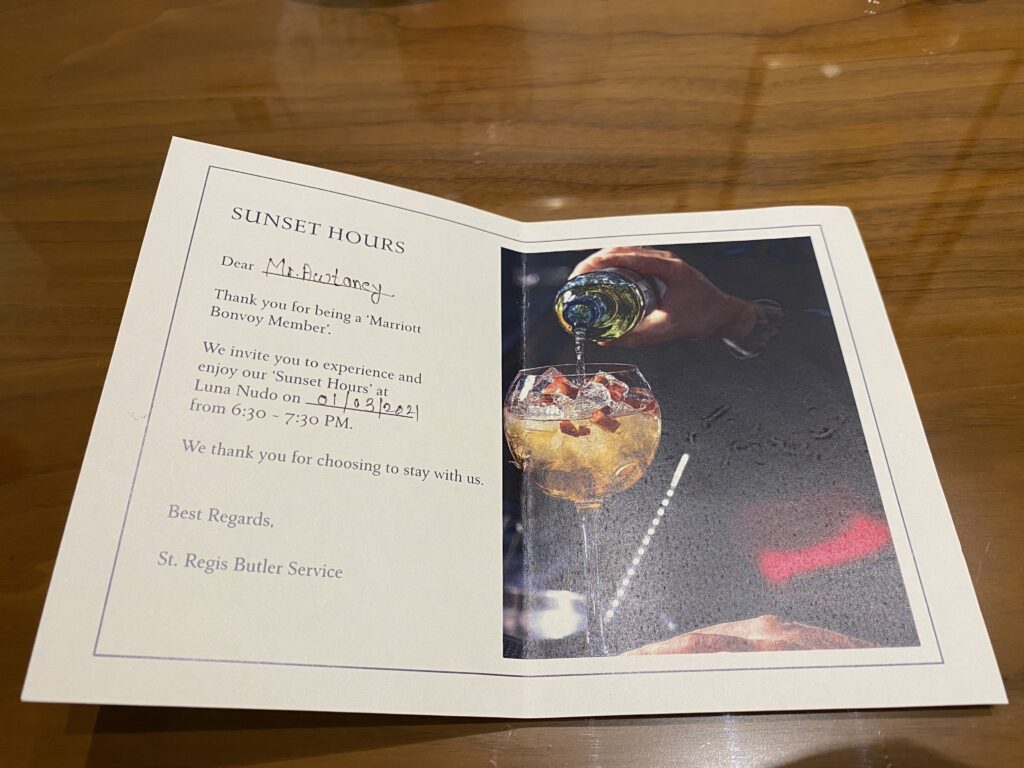 a menu with a picture of a drink being poured into a glass