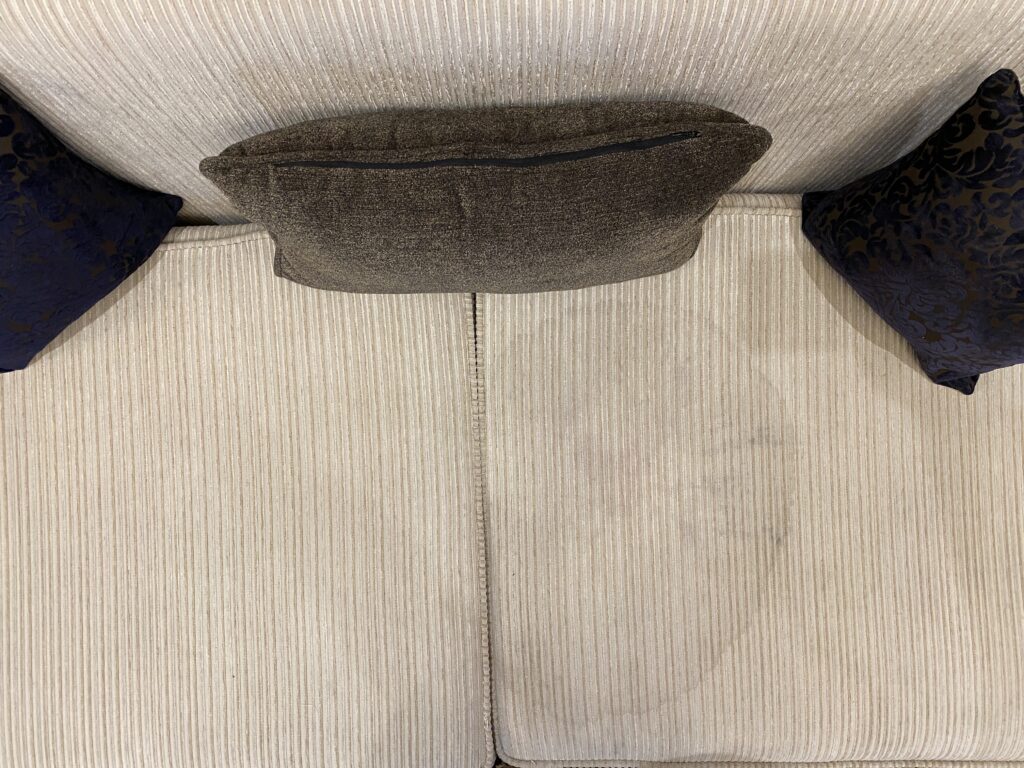 a couch with a stain on it
