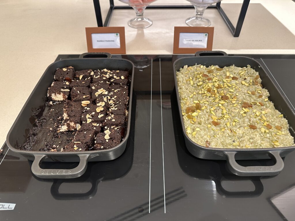 two pans of brownies and brownies on a table