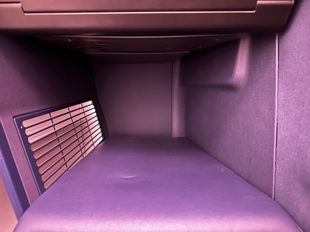 a purple box with metal bars