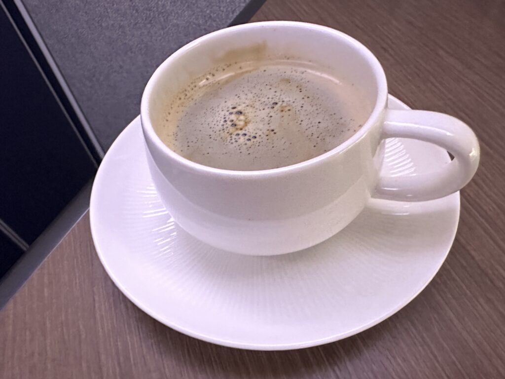a cup of coffee on a saucer