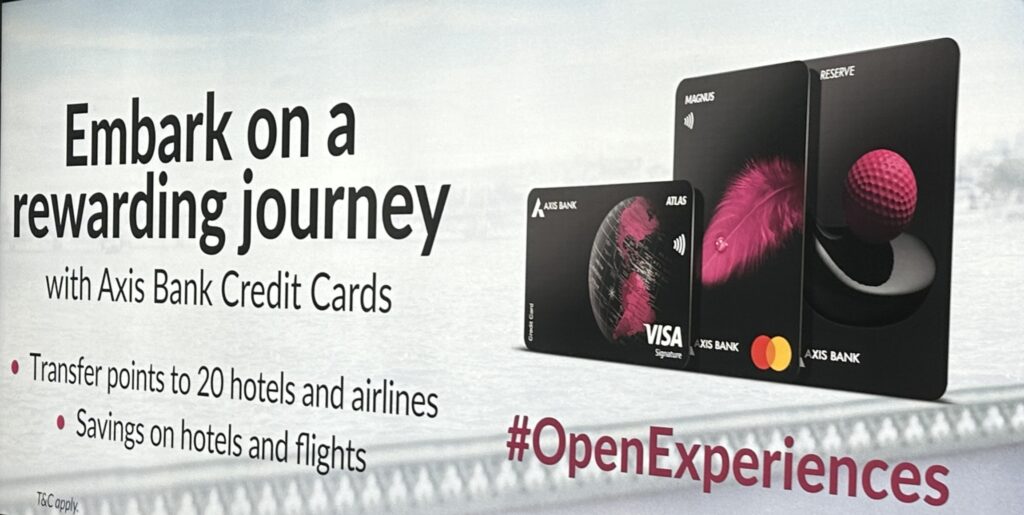 a credit cards with a pink feather