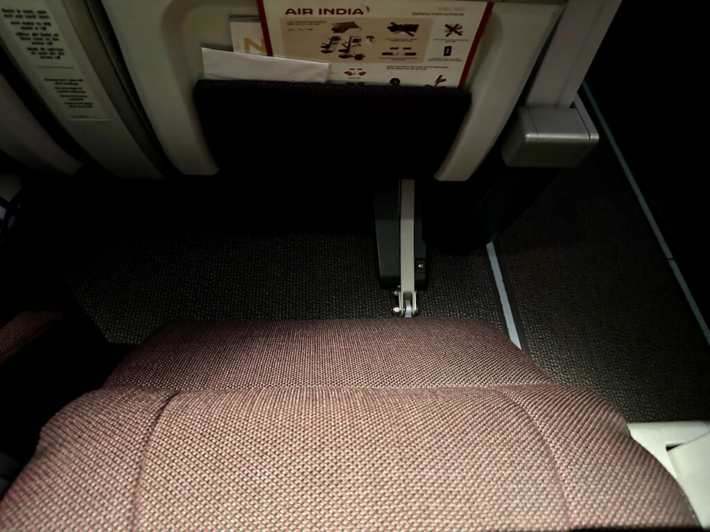 a seat with a paper attached to it