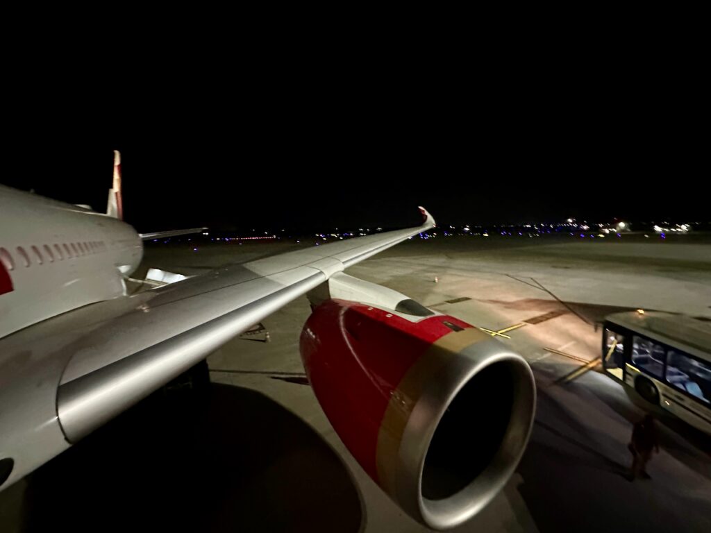 an airplane wing at night