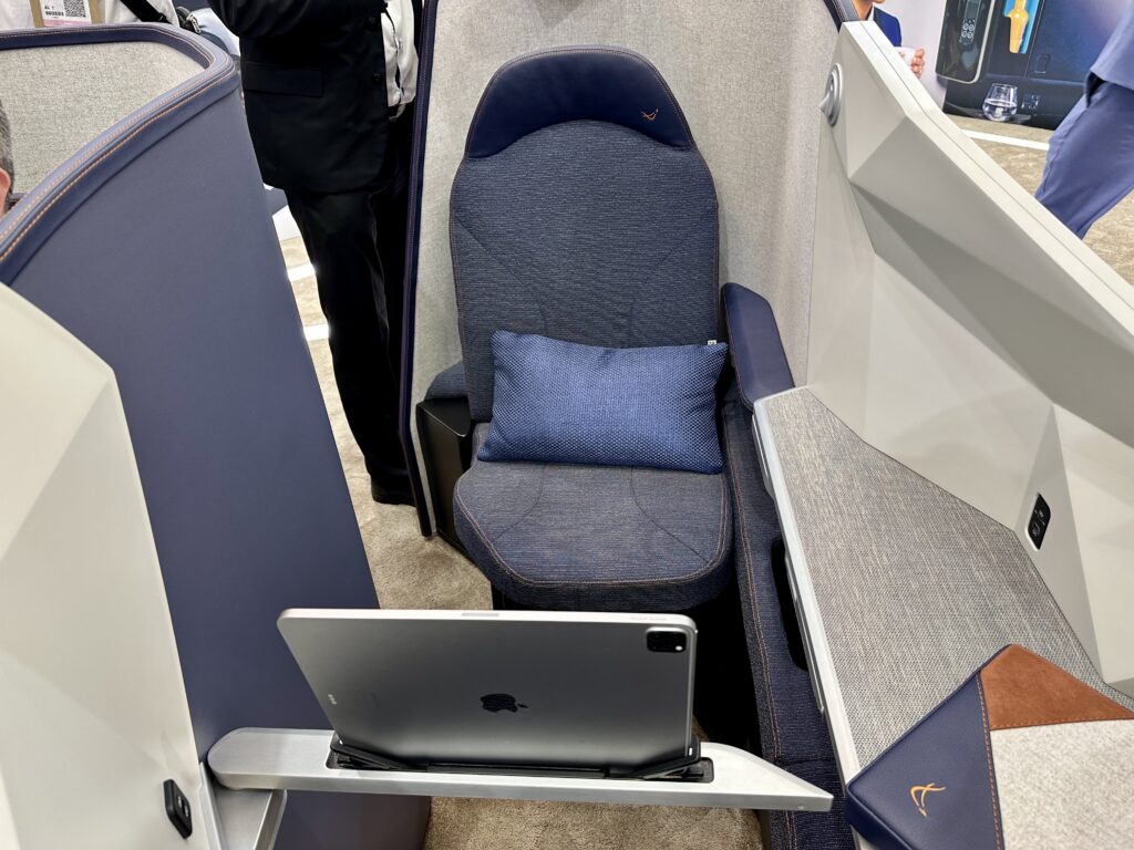 a seat with a laptop on it