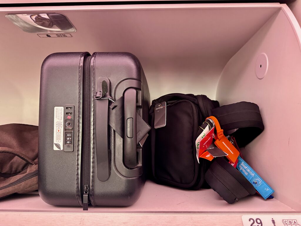 a suitcases in a shelf