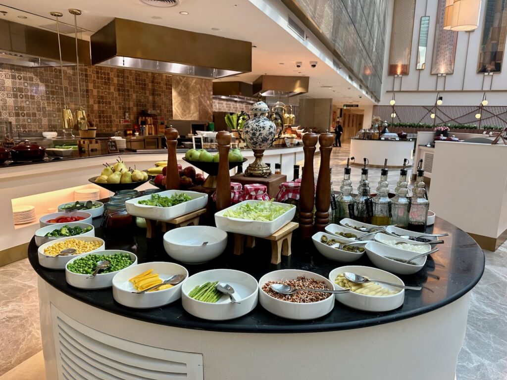 a buffet table with different food items on it