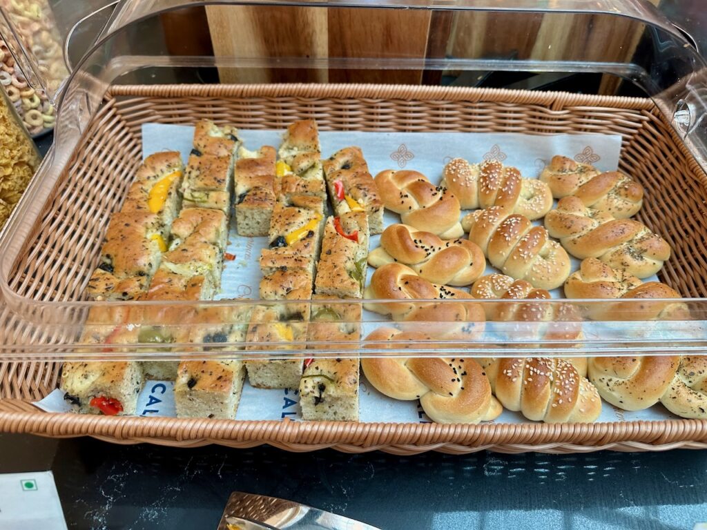 a basket of pastries in a plastic container