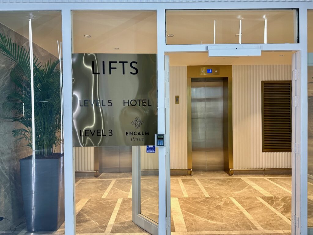 a glass door with a sign on it