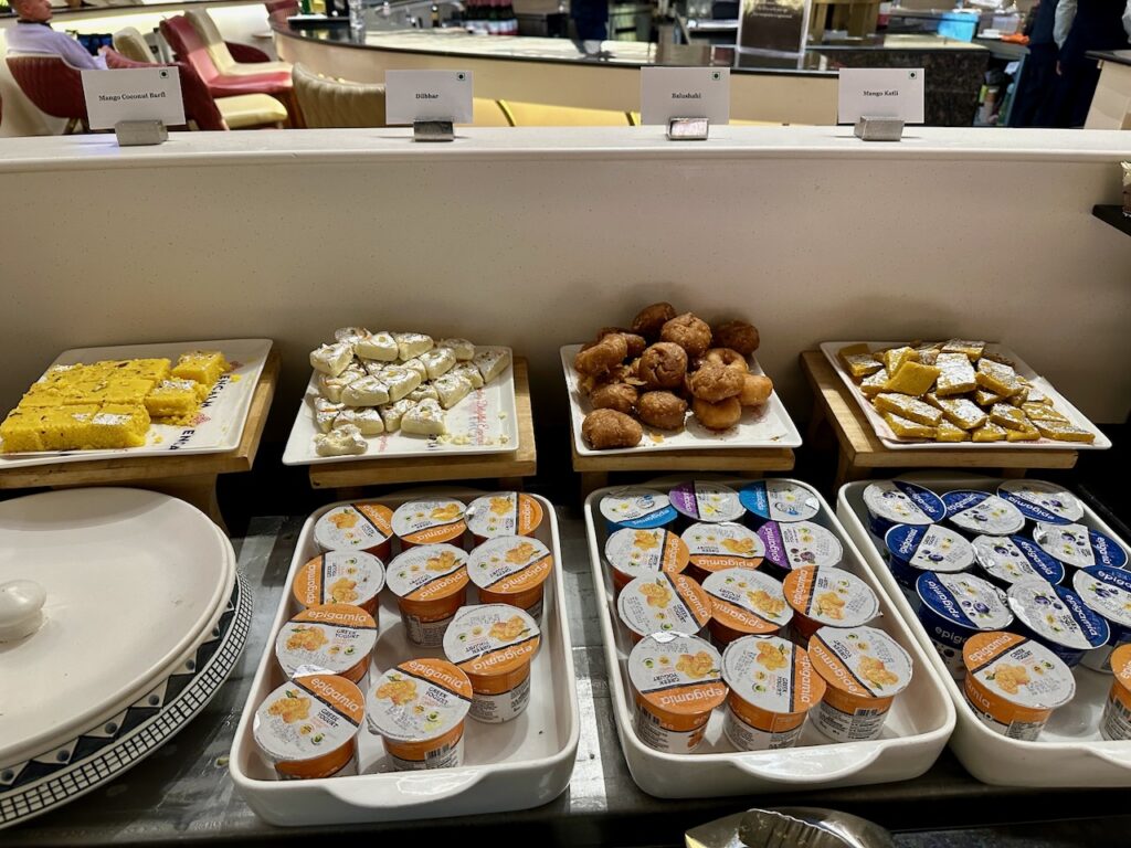 a trays of food on a counter