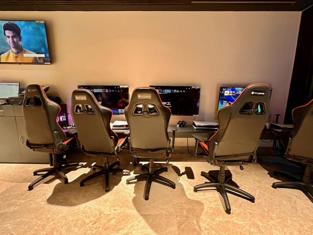 a group of chairs in a room with computers