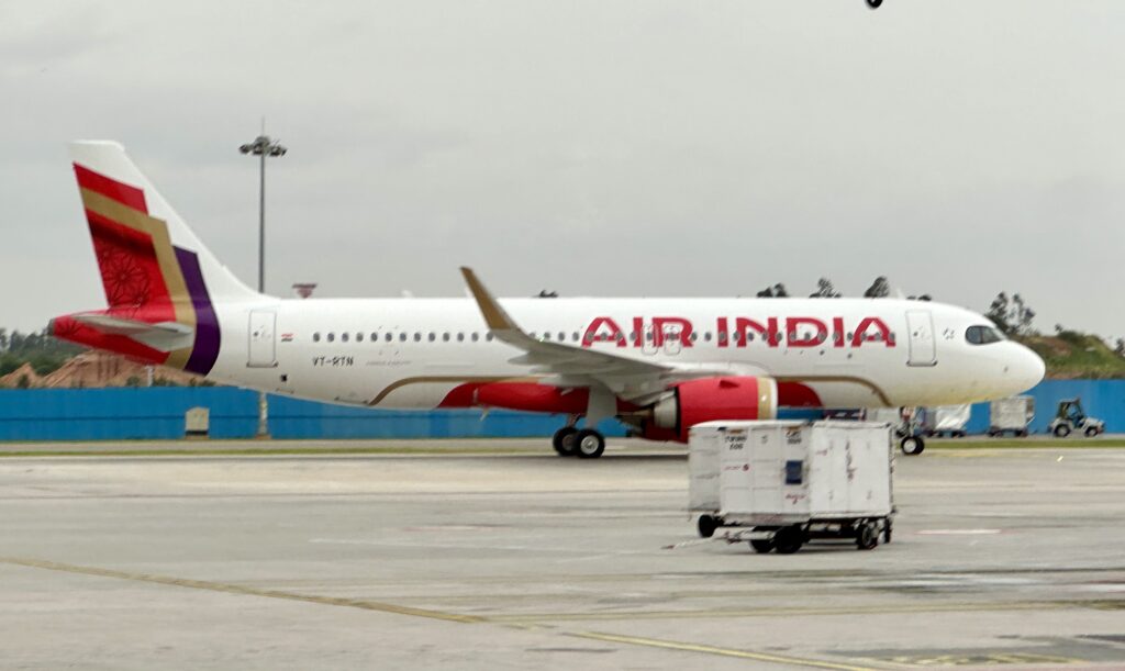 a white airplane on the tarmac