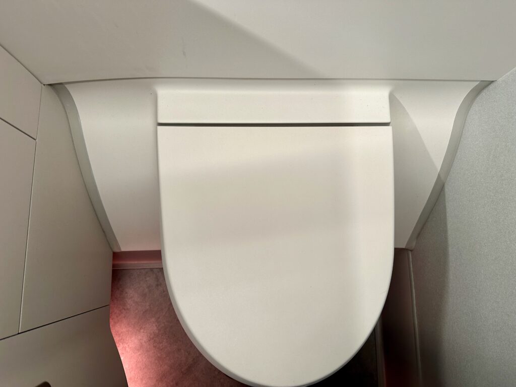 a white toilet in a bathroom