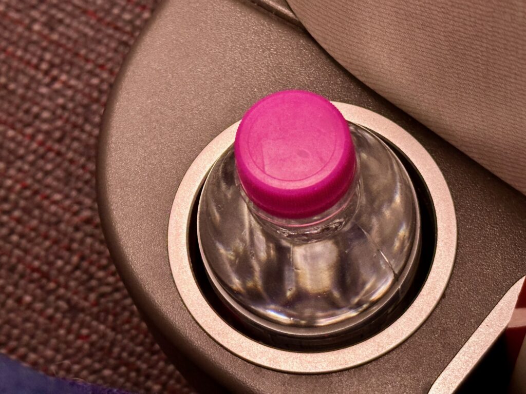 a bottle in a drink holder