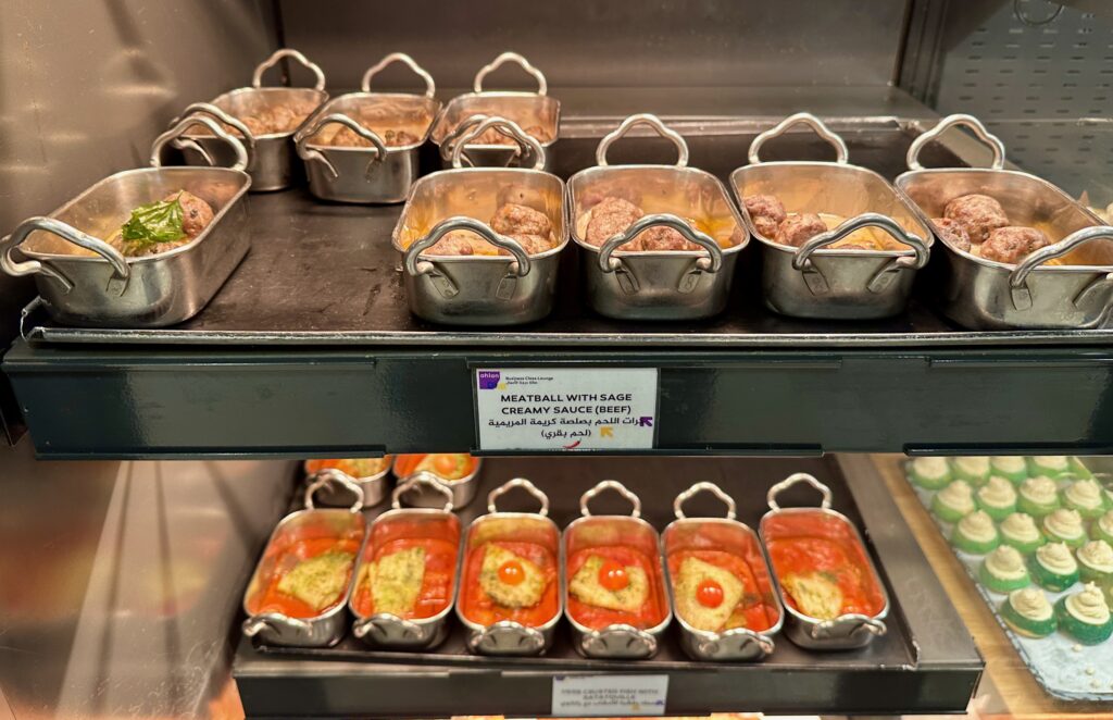 a trays of food on a shelf