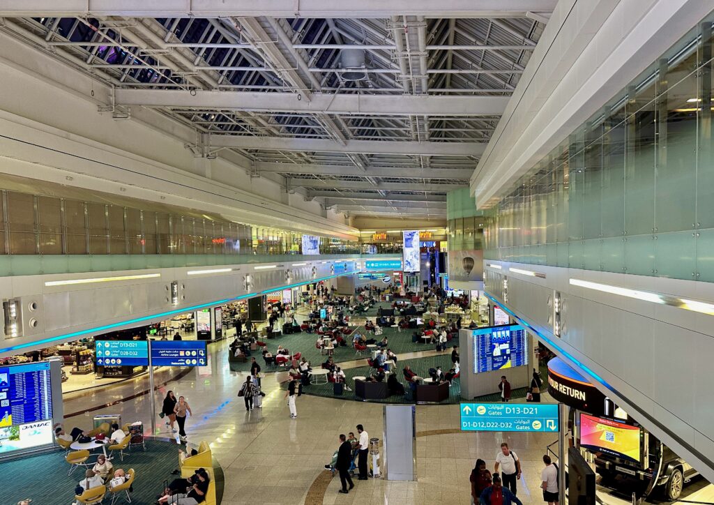 a group of people in a terminal