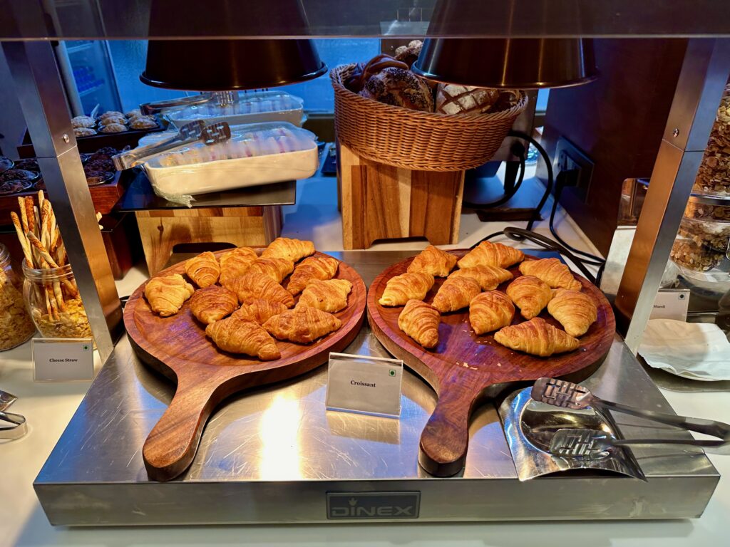 a group of croissants on a table