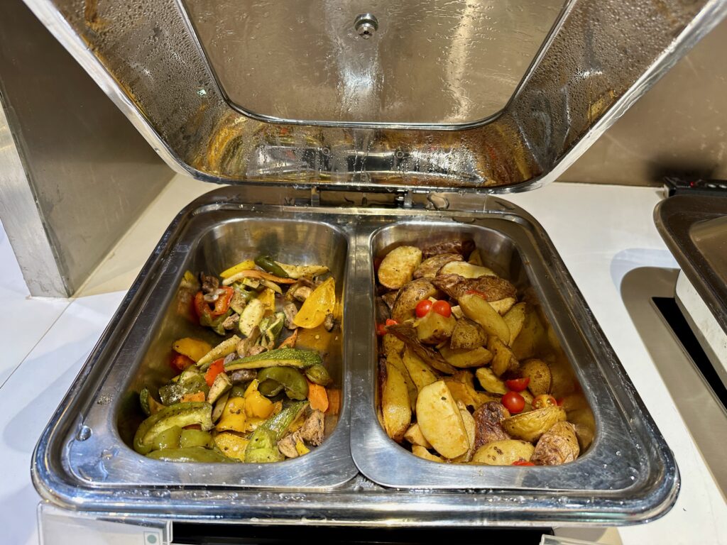 a tray of food with a lid open