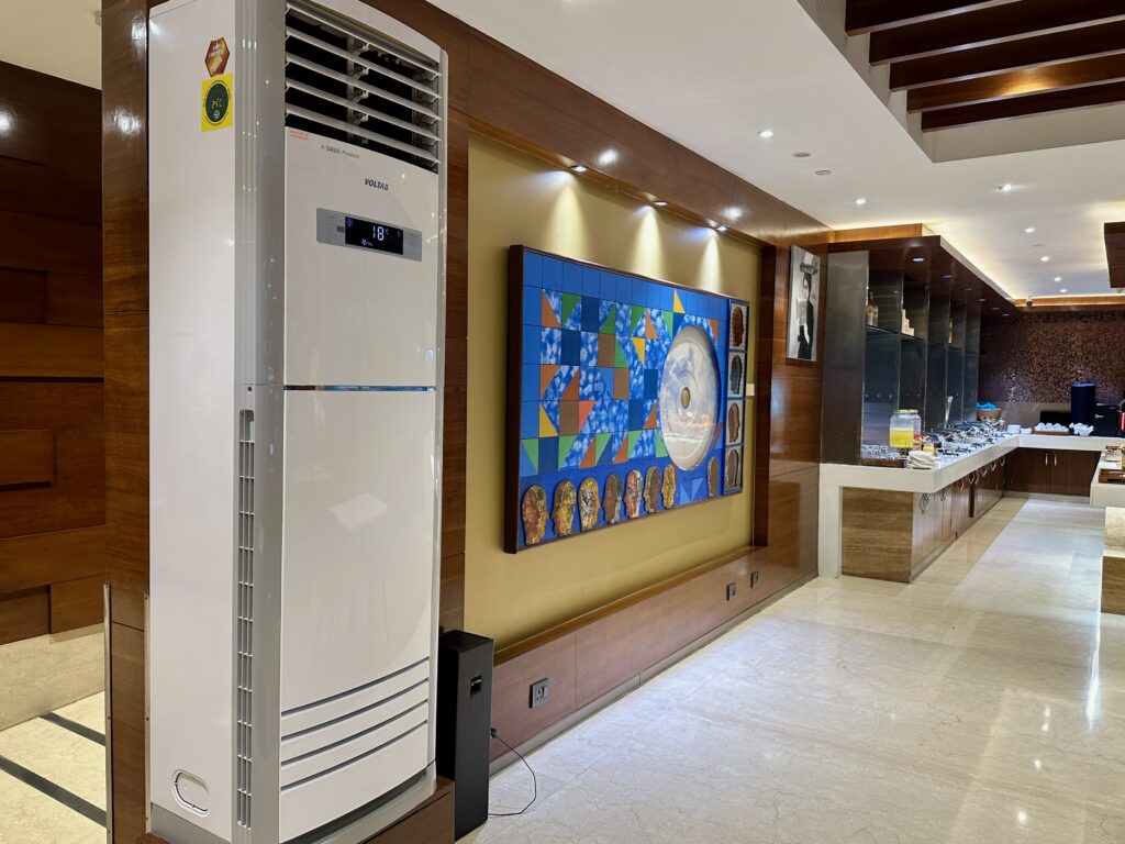 a large white refrigerator in a room