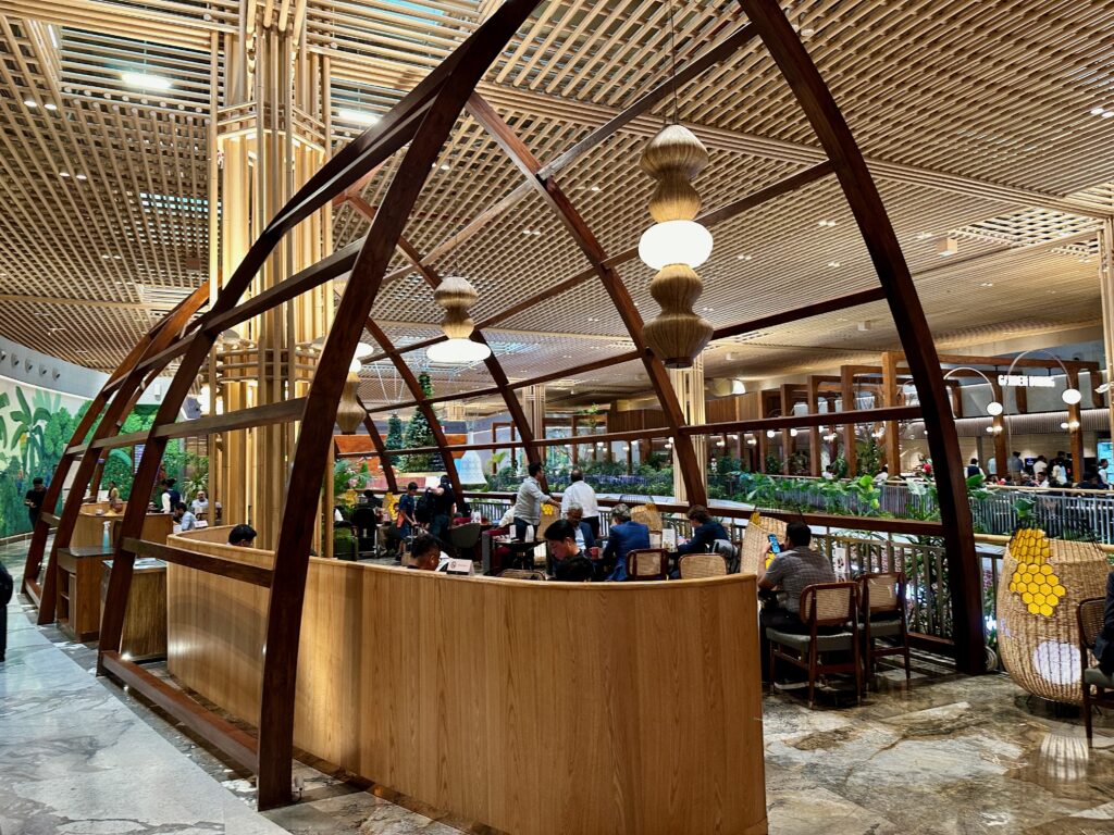 a group of people sitting at a table in a restaurant