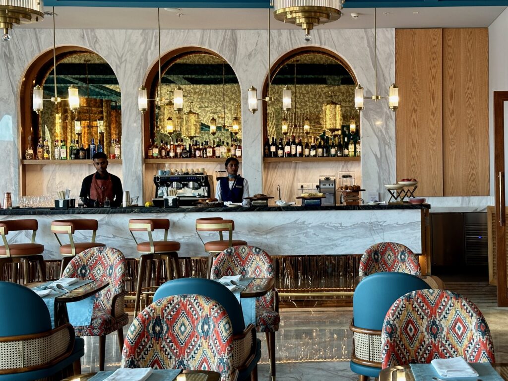 a restaurant with tables and chairs