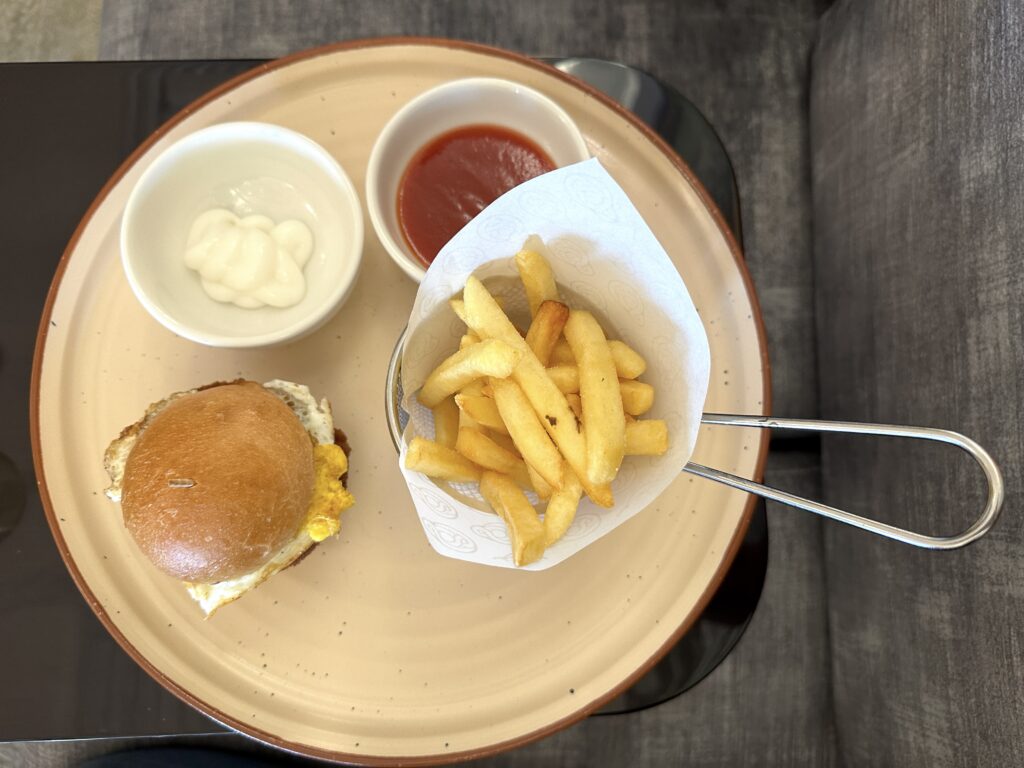 a plate of food with a burger and fries