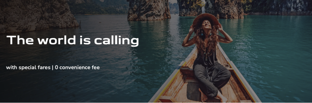 A woman is sitting on a wooden boat in a serene body of water, surrounded by rocky cliffs and lush greenery. She is wearing a large hat and appears relaxed, with her hands touching the brim of the hat. The text on the image reads "The world is calling" and "with special fares | 0 convenience fee."