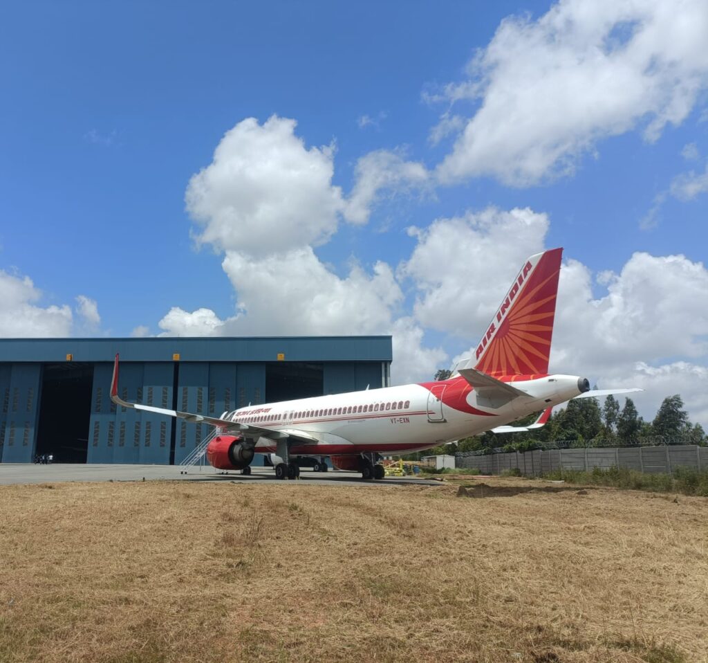 a plane parked in a field