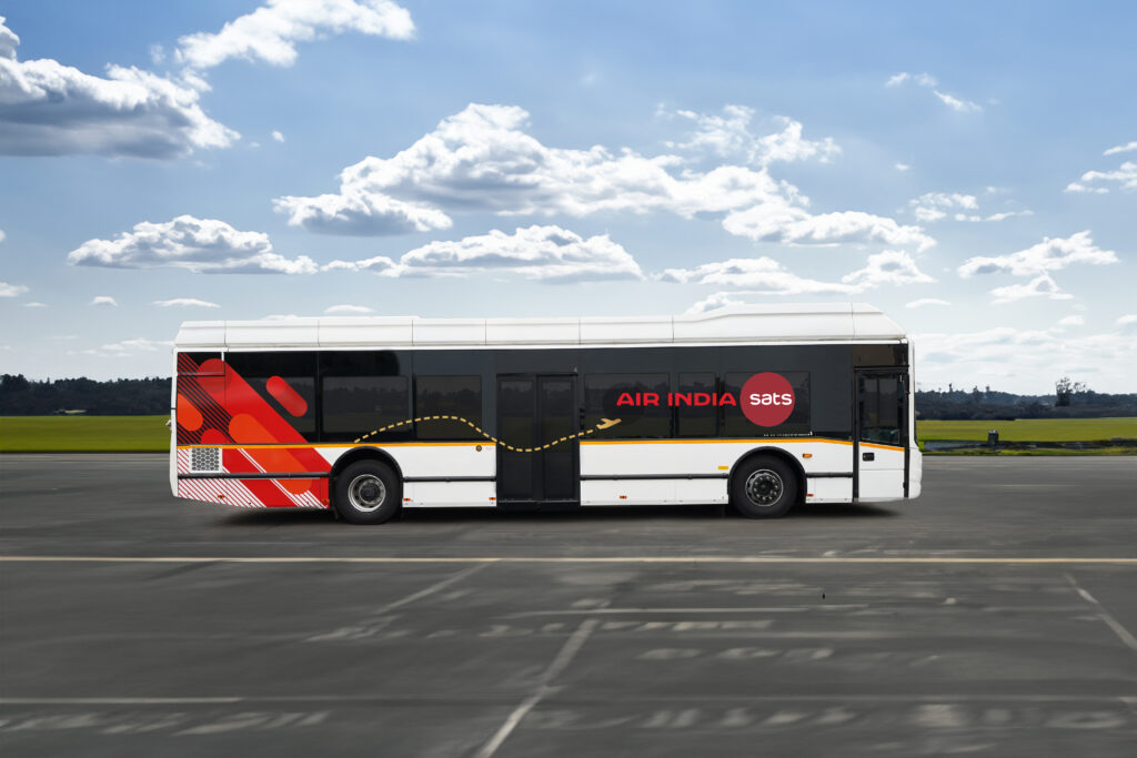 a white bus on a parking lot