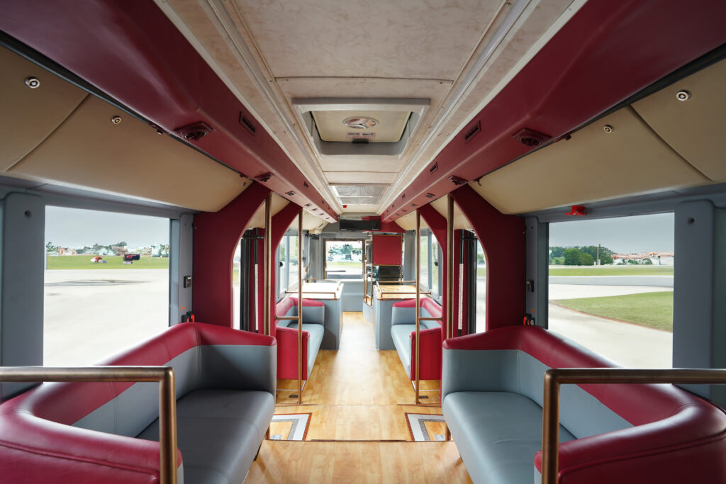 inside a bus with seats and windows