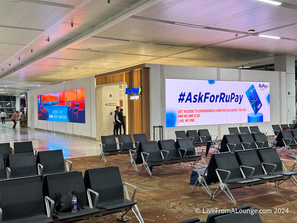 a man standing in an airport