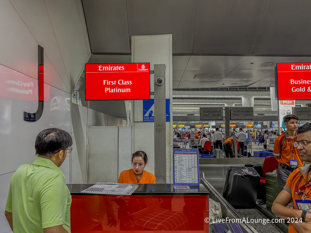 a woman at a desk in an airport