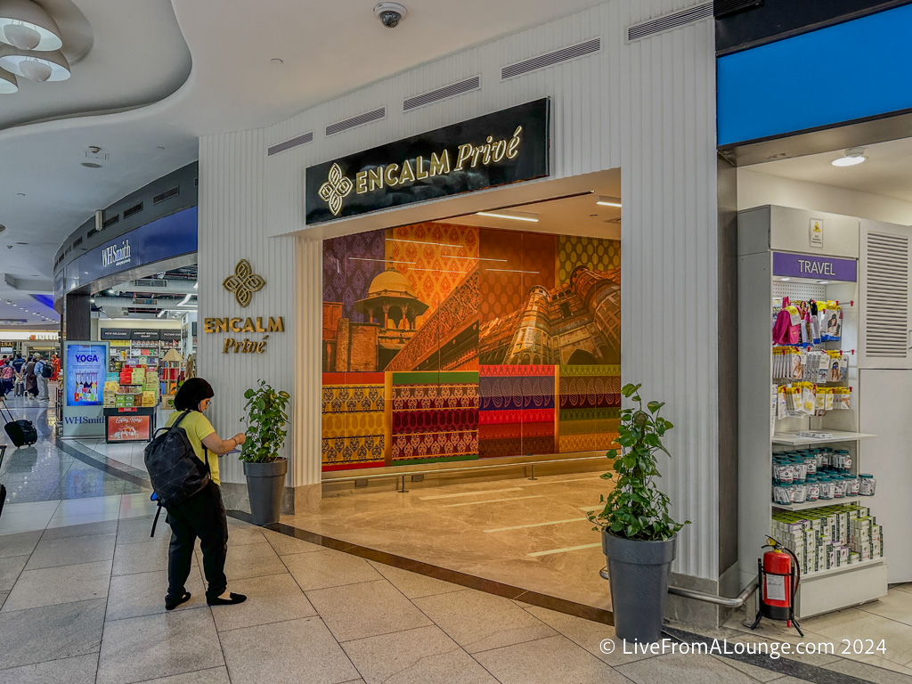 a woman standing in front of a store