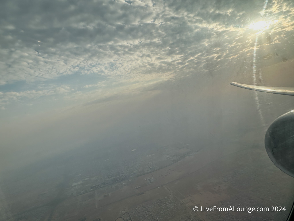 an airplane wing in the sky