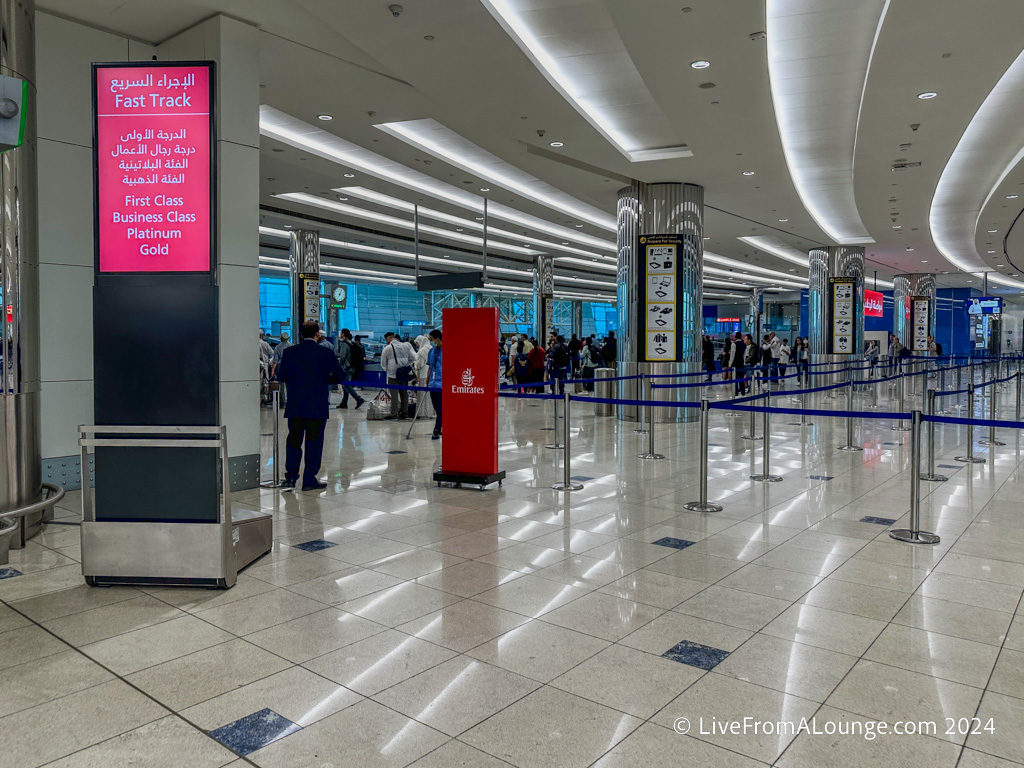 a group of people in a large airport