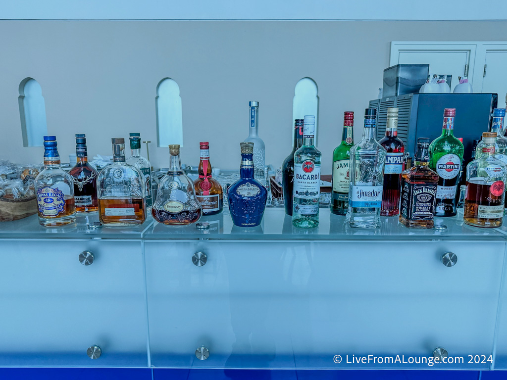 a group of bottles of alcohol on a counter