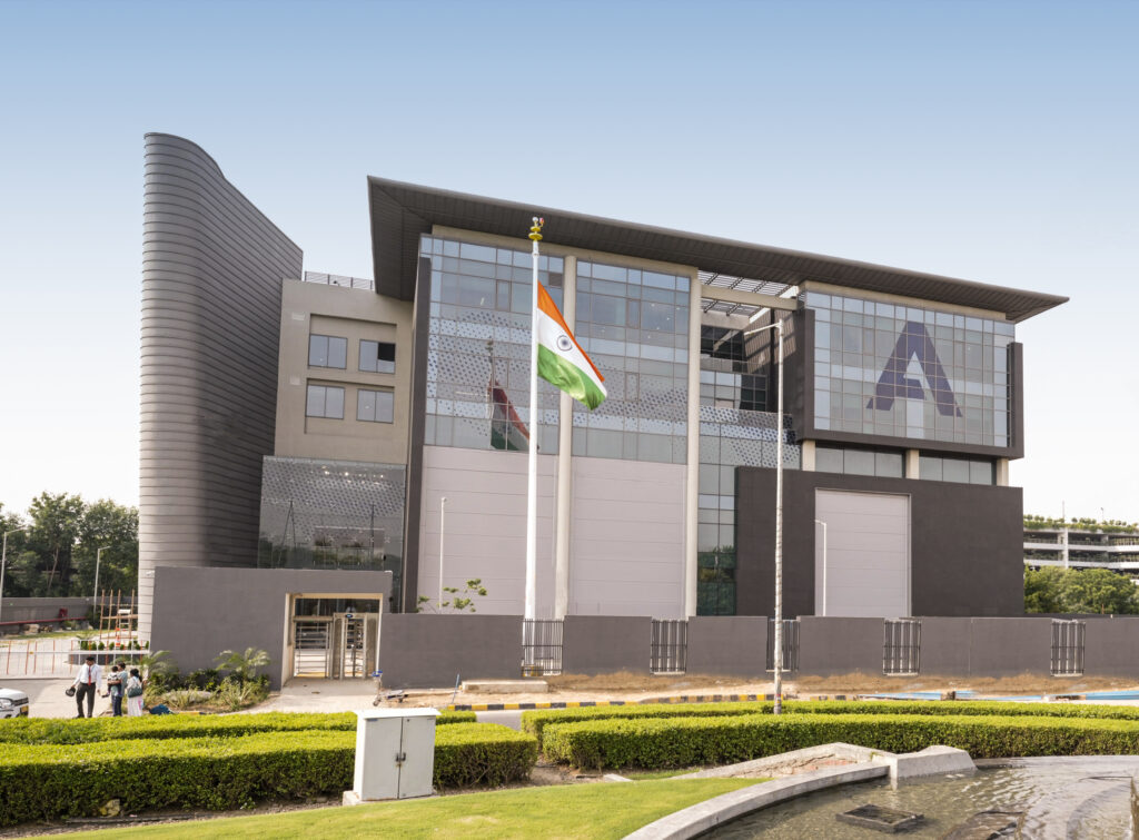 a building with a flagpole in front of it