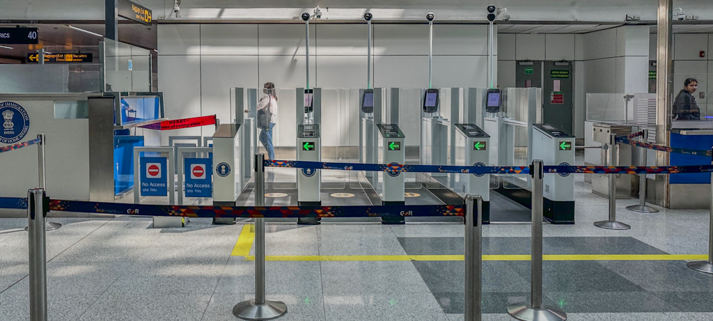 a person standing in a line at an airport