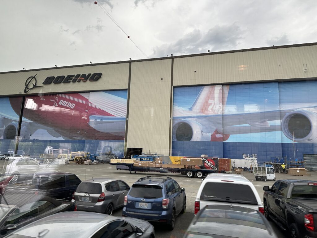 a large building with a large airplane painted on the side