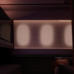 a room with a tv and a window