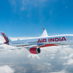 a white airplane flying in the sky