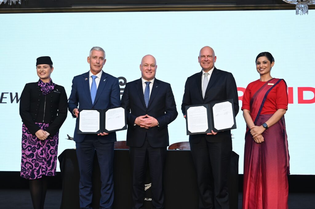 a group of people holding papers