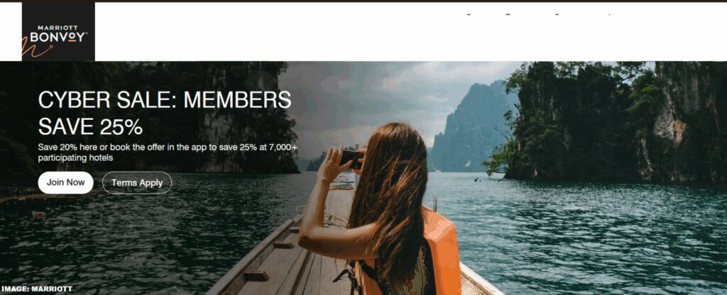 a woman taking a picture of a boat