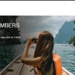 a woman taking a picture of a boat