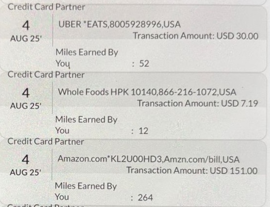 The image shows a section of a credit card statement with three transactions listed. Each entry includes the date "4 AUG 25", the merchant name, transaction amount, and miles earned. The transactions are from Uber Eats for USD 30.00 with 52 miles earned, Whole Foods for USD 7.19 with 12 miles earned, and Amazon for USD 151.00 with 264 miles earned.