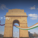 The image features the India Gate monument with a clear blue sky and a few clouds. An airplane is flying above, and a ribbon in the colors of the Indian flag (orange, white, and green) is flowing across the image. Text on the left reads "Celebrate Independence Day with us" and "Fly with us and save up to 25%*". Trees with autumn foliage are visible in the background.