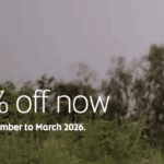 A young boy is joyfully holding up the Indian flag in a grassy field. An airplane is visible in the sky. The text on the left reads: "Hi, Ajay. Get up to 30% off now. Book by 15 Aug for travel between September to March 2026. Book now."