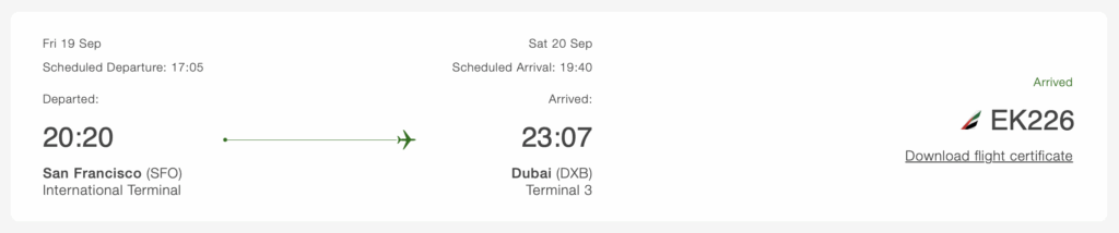 This image shows a flight information summary. The flight departed from San Francisco (SFO) International Terminal on Friday, September 19, with a scheduled departure time of 17:05 and an actual departure at 20:20. It arrived in Dubai (DXB) Terminal 3 on Saturday, September 20, with a scheduled arrival time of 19:40 and an actual arrival at 23:07. The flight number is EK226, and it is marked as "Arrived." There is also an option to download a flight certificate.